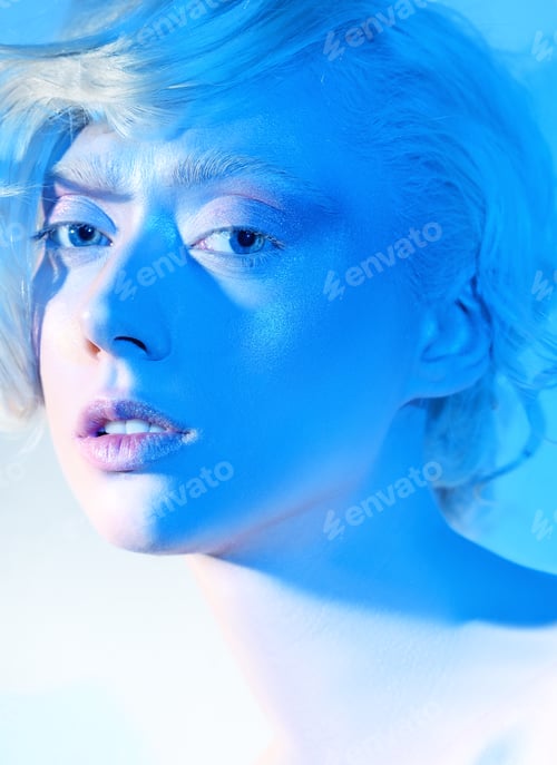 Preview: Beauty Portrait Of A Young Blonde Girl With Blue Eyes.