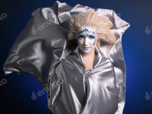 Preview: Portrait Of Winter Woman With A Stylish Visage And Snowy Hair.
