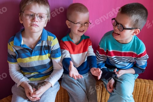 Preview: Three Brothers In Bright Colored Clothes Posing In Front Of Camera With Glasses For Vision