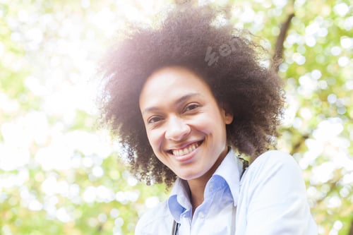Preview: Closeup Portrait Of Lovely Young African American Woman Smiling In Nature ,Positive Face
