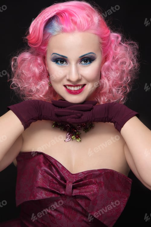 Preview: Smiling Happy Vintage Beauty With Pink Curly Hair And Fancy Make-Up