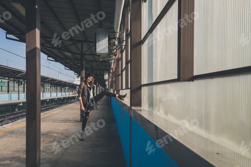 Preview: Pretty Girl With Beanie Posing In A Metro Station