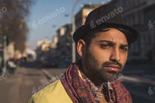 Preview: Portrait Of An Indian Young Handsome Man Posing In An Urban Context