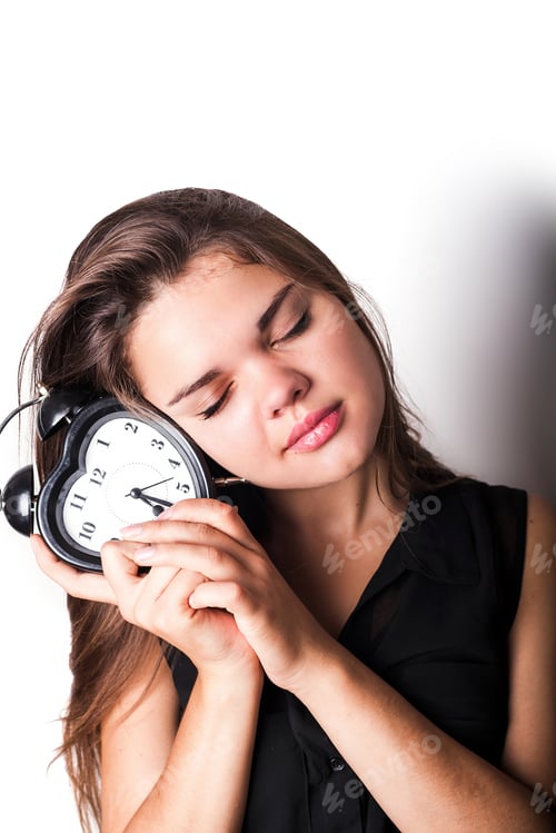 Preview: Smiley Businesswoman Holding Alarm Clock. Isolated On White Background