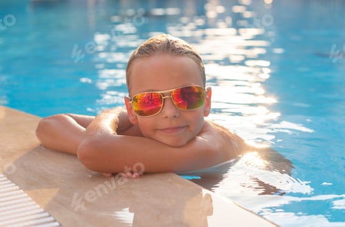 Preview: Boy In Sunglasses In The Pool. Concept Of Travel, Summer, Vacation, Recreation And Childhood