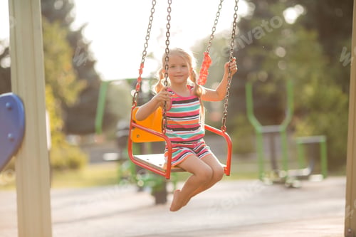Preview: Little Blonde Girl Playing In A Children'S Town, Riding On A Hill, Riding On A Swing, Walking In