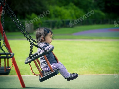 Preview: Baby Girl Playing In The Playground