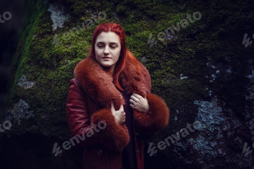 Preview: Beautiful Red-Haired Young Woman Is Walking In The Autumn Park. Melancholy Mood