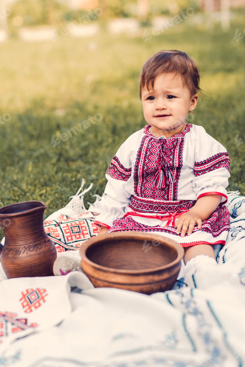 Preview: The Little Girl In The National Costume On A Picnic