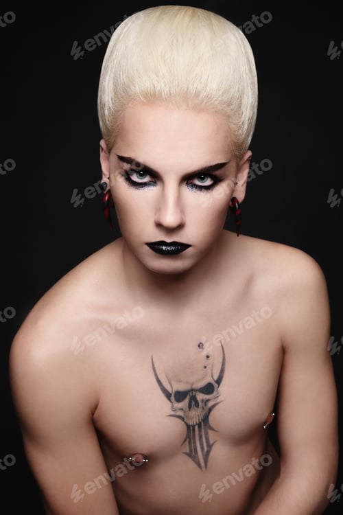 Preview: Portrait Of Young Handsome Glamorous Blond Man With Fancy Hairstyle And Make-Up