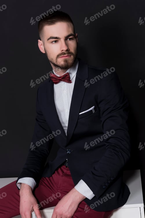Preview: Elegant Young Handsome Man. Studio Fashion Portrait.