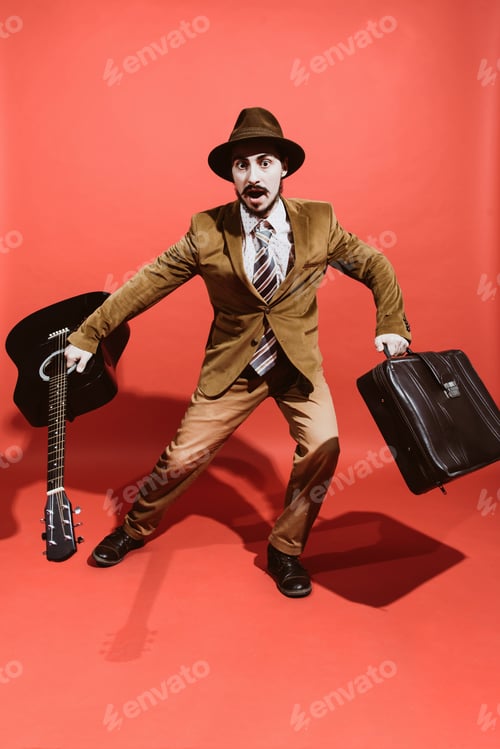 Preview: Positive Guy Playing The Guitar And Posing