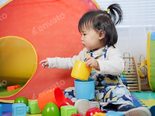 Preview: Baby Girl Play Toy At Home