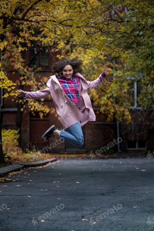 Preview: Portrait Of A Beautiful Happy Smiling Girl At The Outdoor. Autumn
