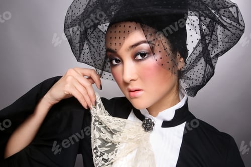 Preview: Portrait Of Beautiful Young Asian Woman With Stylish Makeup In Fancy Clothes