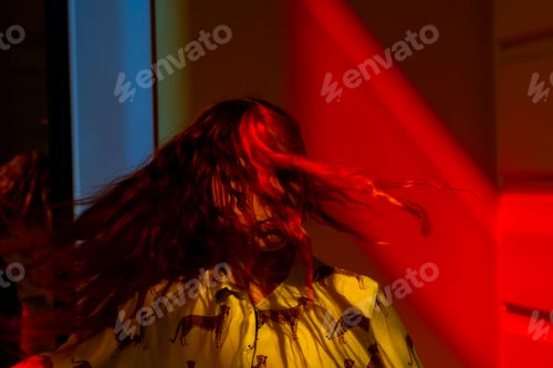 Preview: A Teenage Girl With Pink Hair In Neon Red And Blue Colors
