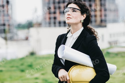 Preview: Close Up Portrait Of Beautiful Girl In A Yellow Protective Helmet And Protective Glasses, An