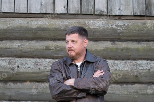 Preview: Portrait Of A Man In A Leather Jacket In The Village