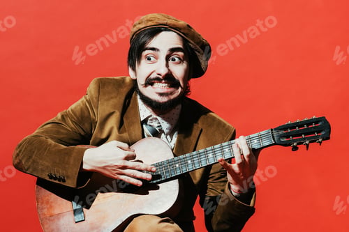 Preview: Positive Guy Playing The Guitar And Posing
