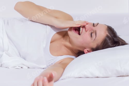 Preview: Waking Up, Young Woman Yawning And Stretching In The Bed.