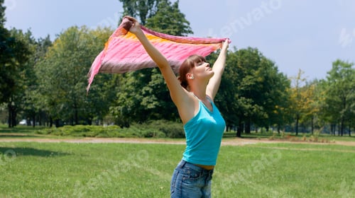 Preview: Attractive Woman Relaxing Outdoors.