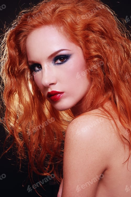Preview: Portrait Of Young Beautiful Sexy Woman With Fiery Red Curly Hair And Stylish Make-Up