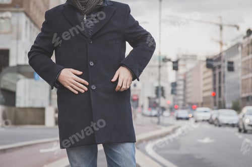 Preview: Detail Of A Young Man With Coat Posing In The City Streets