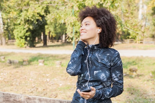 Preview: Beauty And Happy Afro Woman Listening Music After Running At Park, Healthy Living Lifestyle