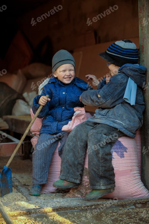 Preview: Happy Farmer'S Children In Back Room With Fodder Grinder