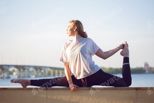 Preview: Healthy And Fly Yoga Concept. Fitness - Beautiful Girl Sitting On A Twine