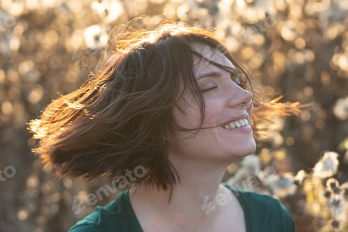 Preview: Portrait Of A Girl Shakes Her Head Standing In A Field