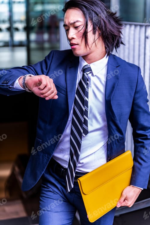 Preview: Handsome Asian Businessman Wearing Suit And Walking Outdoors, Successful Manager During Break