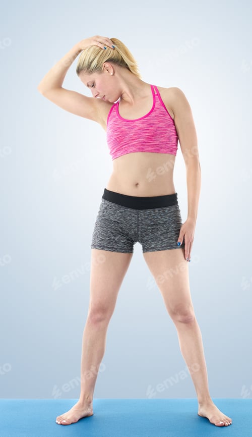 Preview: Woman Making Pilates Mat Exercises.