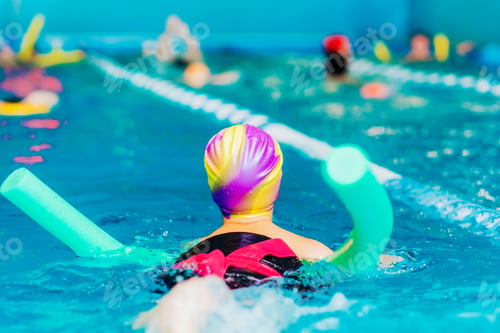 Preview: Small Child Swim In An Indoor Pool.
