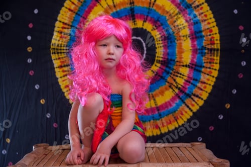 Preview: Happy Cute Caucasian Boy Changed Clothes At Carnival In Dress Of Girl Of Rainbow Color.