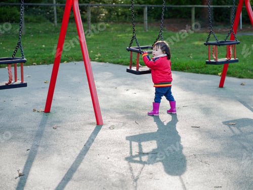 Preview: Baby Girl Playing At Autumn Outdoor Park
