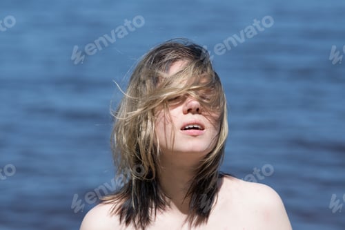 Preview: Portrait Of A Young Beautiful Girl Near The Sea