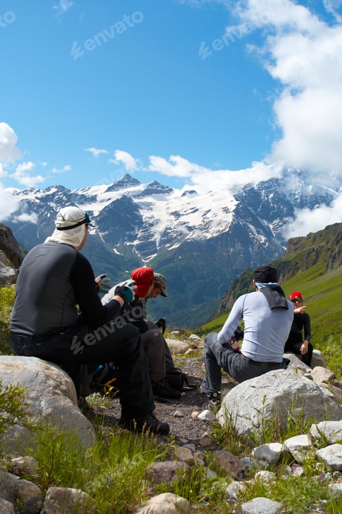 Preview: Group Of Hikers Taking A Rest After Rising