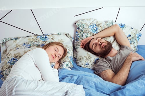Preview: Young Caucasian Couple Sleeping In Bed