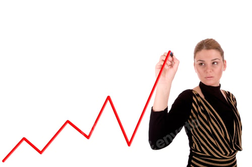 Preview: Businesswoman Drawing A Graph Over White.