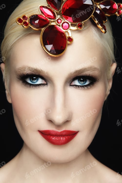 Preview: Close-Up Portrait Of Young Beautiful Blond Girl With Stylish Make-Up And Red Plastic Butterflies