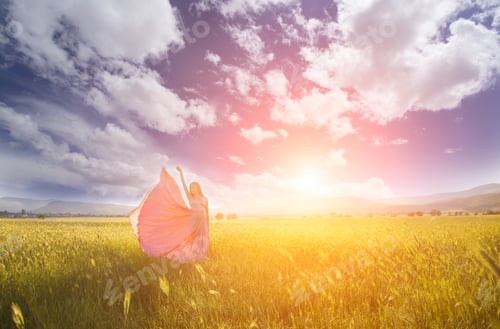 Preview: Young Woman Standing On A Wheat Field With Sunrise On The Background. Beauty Romantic Girl