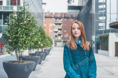 Preview: Beautiful Young Redhead Girl Posing In The City Streets