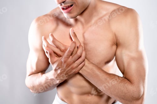 Preview: Sportsman Having Chest Muscle Muscle Pain. Isolated On White Background