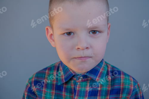 Preview: Portrait Of Smiling Boy In Plaid Shirt