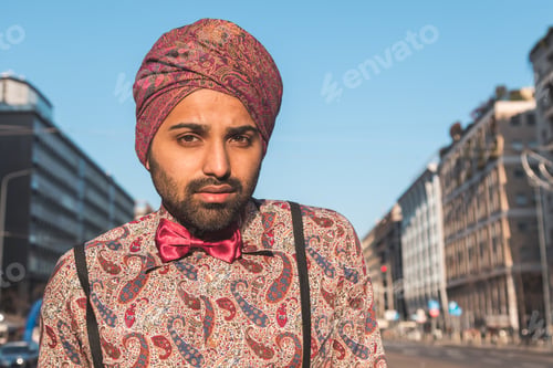 Preview: Portrait Of An Indian Young Handsome Man Posing In An Urban Context
