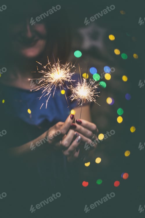 Preview: Girl Holds Bengal Lights - Happy Christmas And Merry Holidays