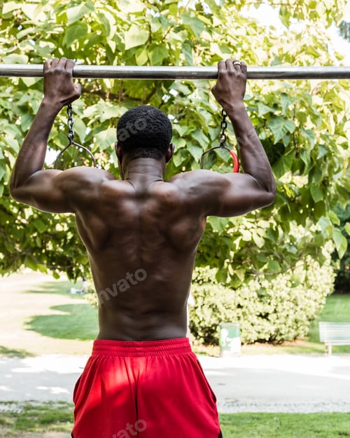 Preview: Athletic Man Posing In A City Park. Concept Of Healthy Lifestyle.
