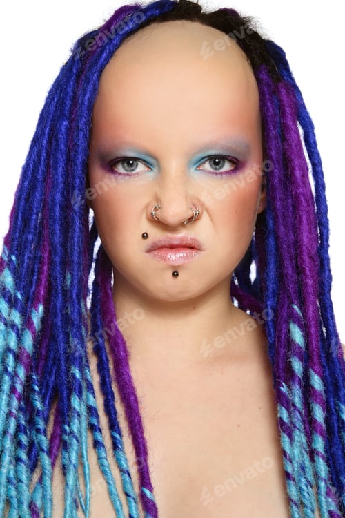 Preview: Portrait Of Stylish Freaky Girl With Blue Dreads And Disgust Expression