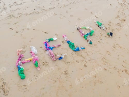 Preview: Help Lettering Made From Trash On The Beach